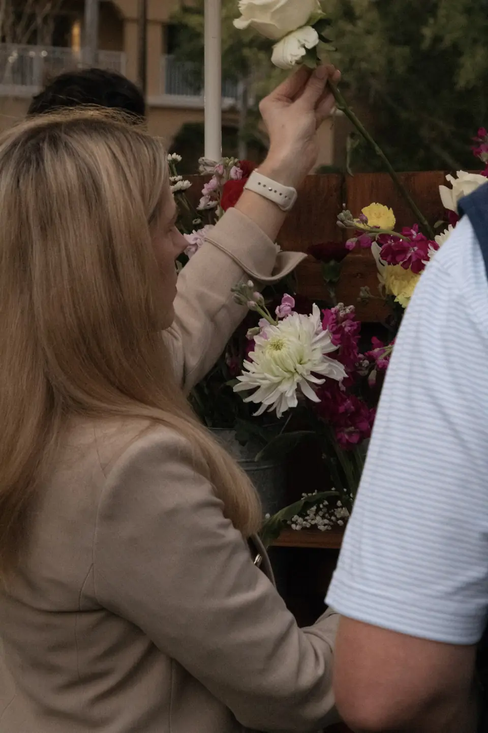 Guest choosing stems at a corporate reception, Orlando